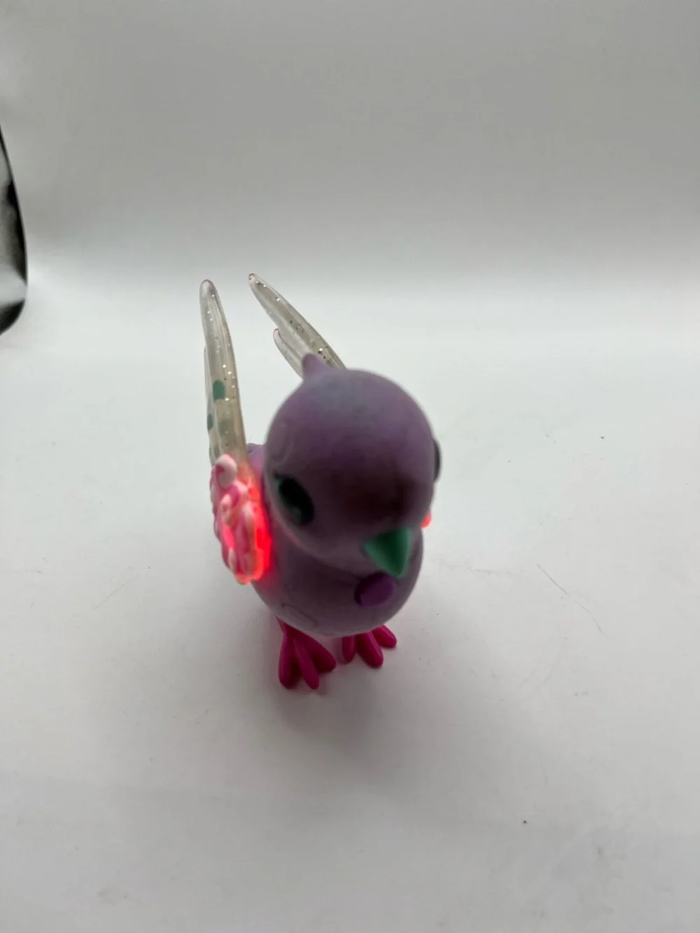 Polly Pearl Purple Decorative Pet Bird Toy with Pink Accents Lights Up and Chirp